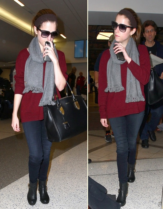 Anna Kendrick hides behind her iPhone at LAX