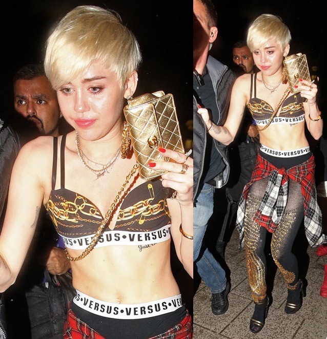 miley-cyrus-enters-club-fully-clothed-leaves-in-bra-02-horz