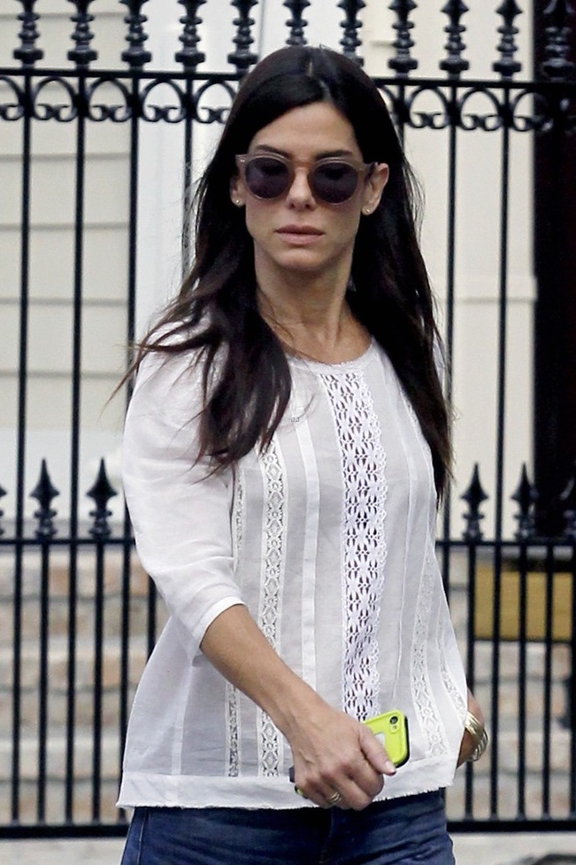 EXCLUSIVE:Sandra Bullock takes an early morning walk with her bodyguard in the Garden District, New Orleans