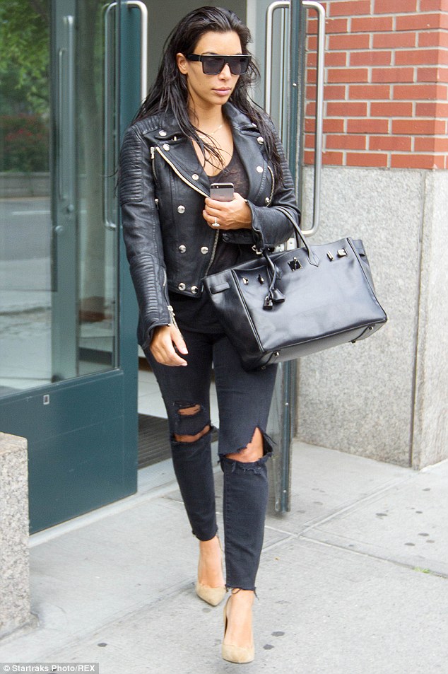 kim kardashian ripped jeans studded jacket