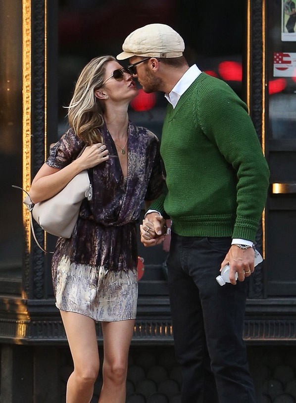 EXCLUSIVE: Loved up Gisele Bundchen and Tom Brady meet on the street and share a kiss before heading out for a romantic evening in NYC