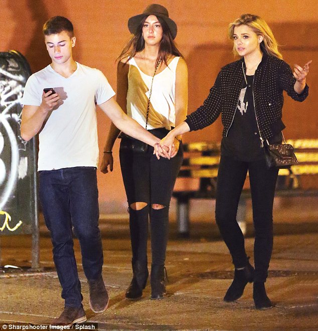 chloe moretz julian moraes hold hands saint laurent boots 2