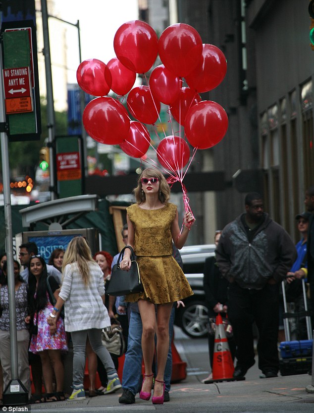 taylor swift gold top skirt pink ankle strap pumps