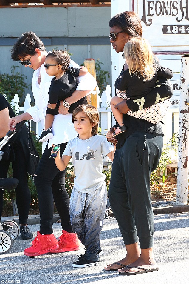 kris jenner babysit red sneakers 5