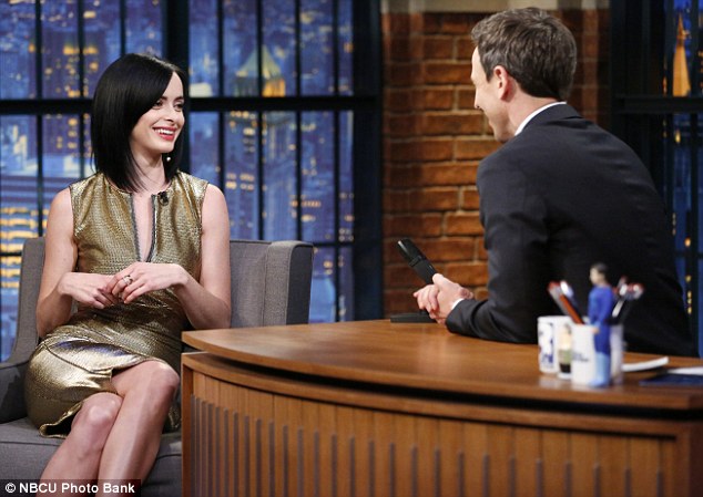 krysten ritter seth meyers gold dress black cutout pointy pumps 2