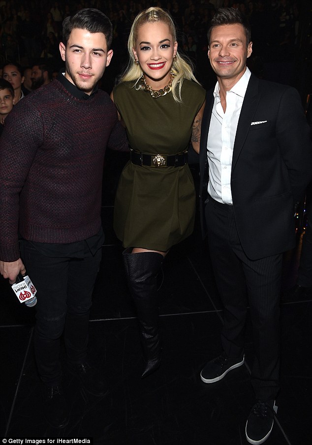 rita ora thigh boots jingle ball green dress