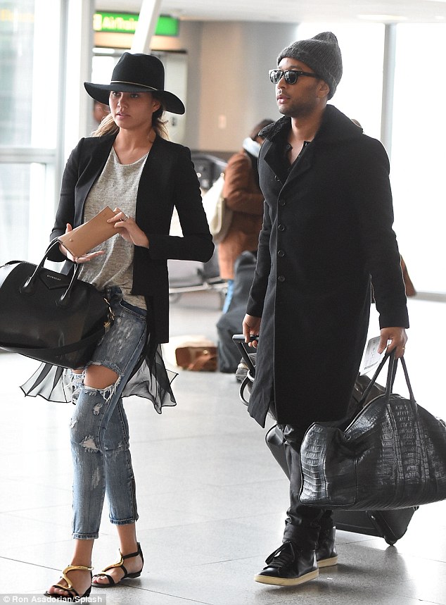 chrissy teigen no make up jfk giuseppe zanotti sandals january 2015 2