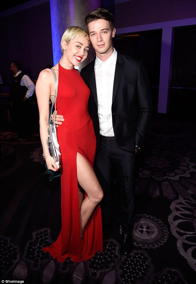 miley cyrus red gown silver sandals clive davis pre grammy 1