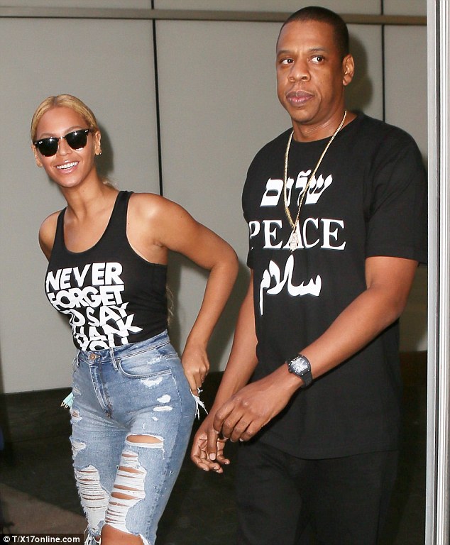 Beyonce Channels the 80s for Her Distressed Denim Look Hot