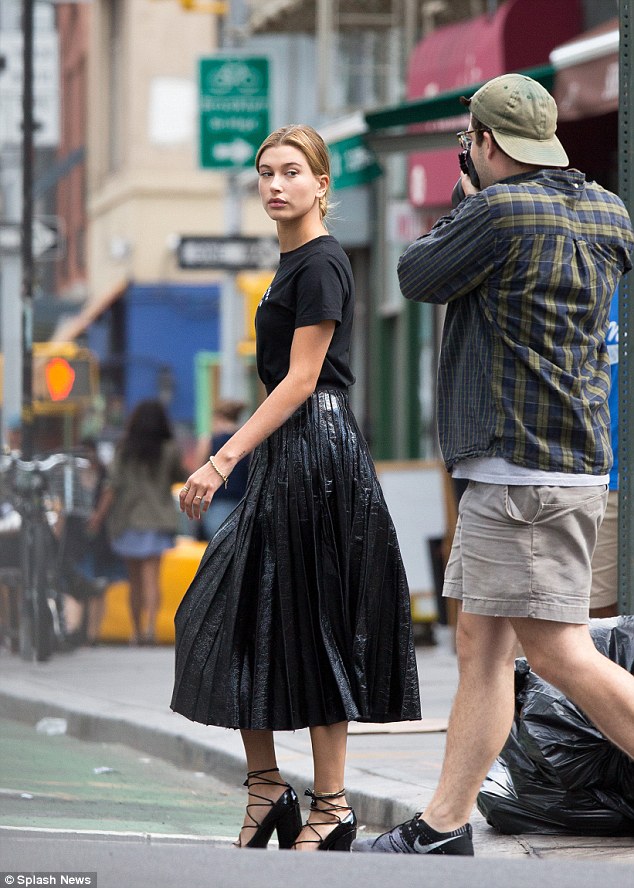 hailey baldwin photo shoot black leather pleated skirt and lace up pumps 2
