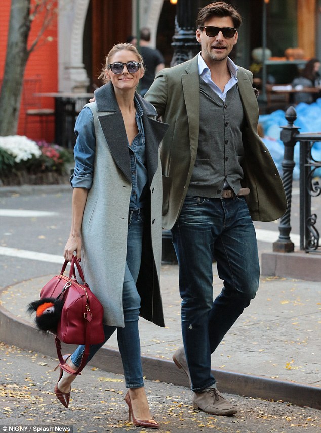 Olivia Palermo and Johannes Huebl are seen at the Louis Vuitton Store