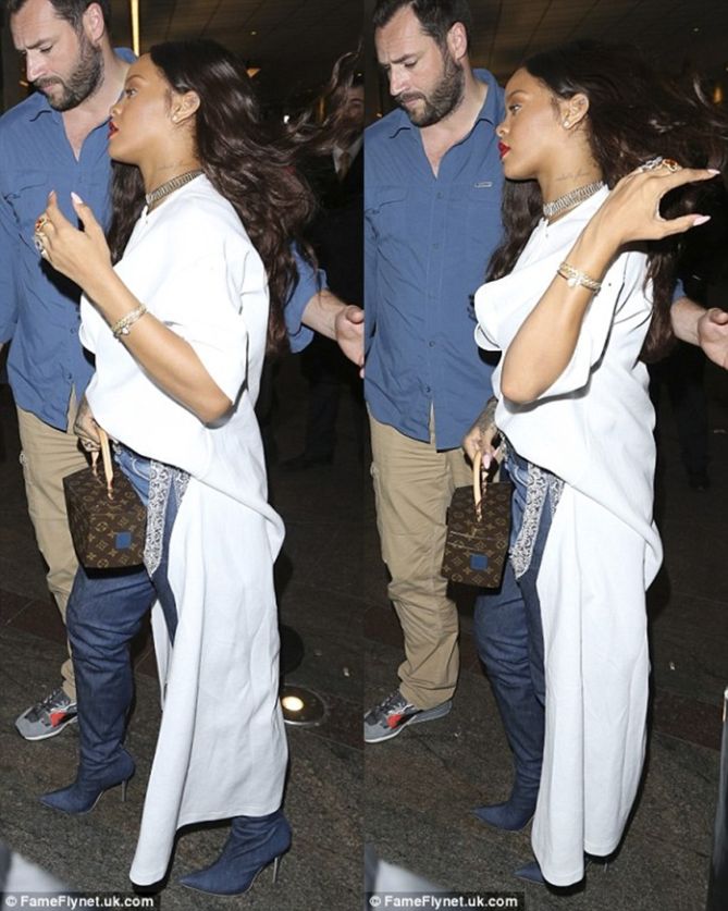 Rihanna Helpfully Demonstrates the Proper Way to Wear Those Manolo Blahnik  Denim Boots - Racked