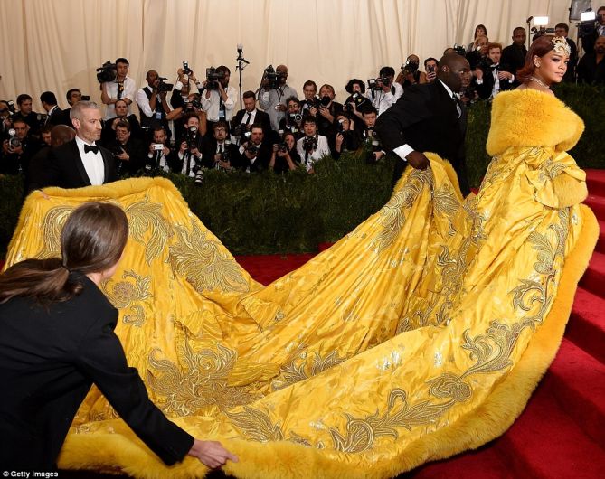 Rihanna Looks Like Royalty as She Impresses in Gold Robe at the MET ...