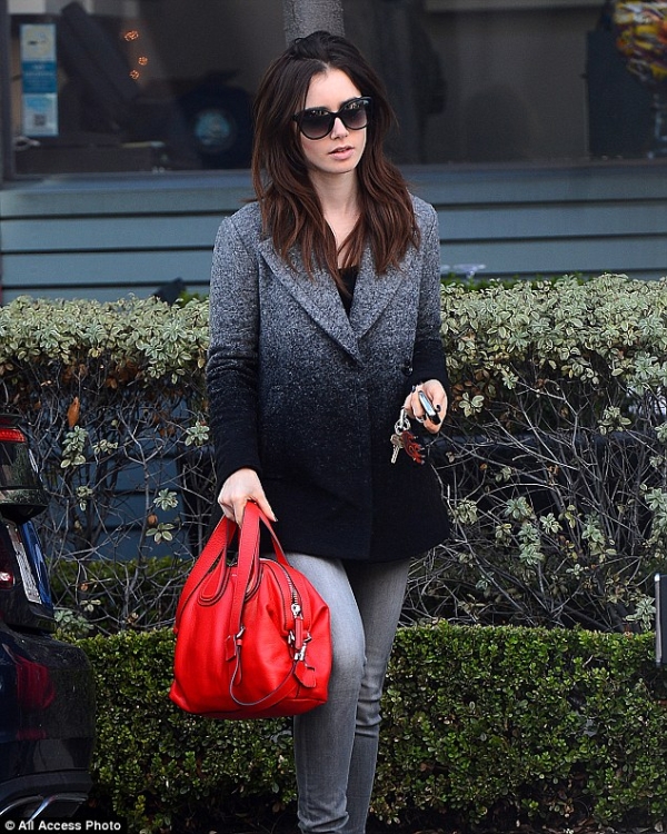 Lily Collins in Glass-Heeled Boots as She Debuts Long Hair – Shoes Post