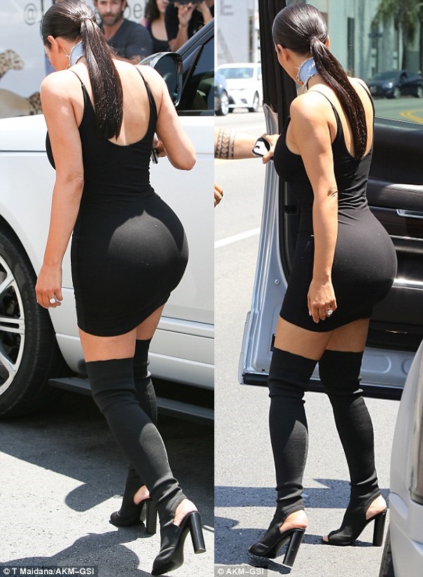 Jaws Drop as Kim Kardashian Steps Out in Skintight Mini-Dress and