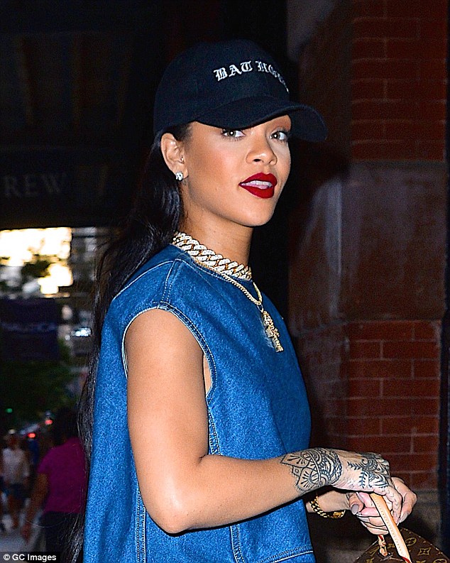 Rihanna Helpfully Demonstrates the Proper Way to Wear Those Manolo Blahnik  Denim Boots - Racked