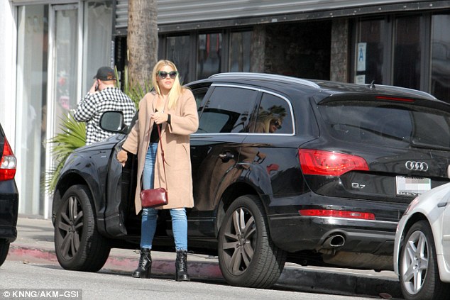 Busy Phillips is back in business just a day after Christmas wearing a pair  of Louis Vuitton ankle boots – Shoes Post