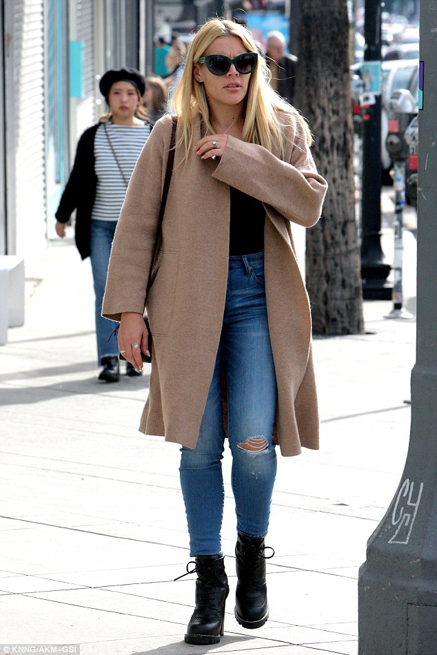 Busy Phillips is back in business just a day after Christmas wearing a pair  of Louis Vuitton ankle boots – Shoes Post