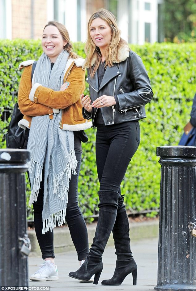 Abbey Clancy is looking casual in a pair of Stuart Weitzman boots ...