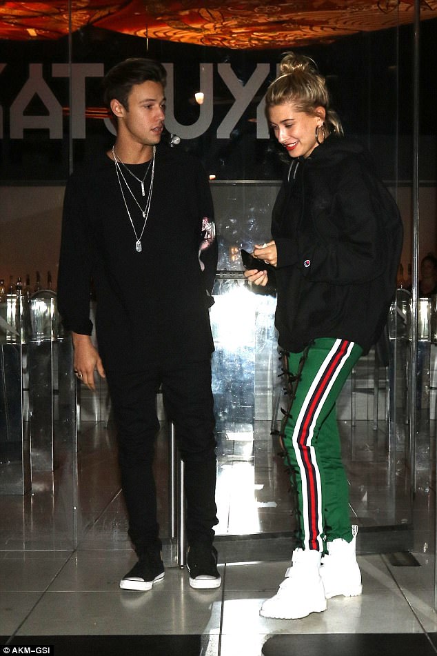 Hailey Baldwin is wearing a pair of Dr. Martens boots Shoes Post