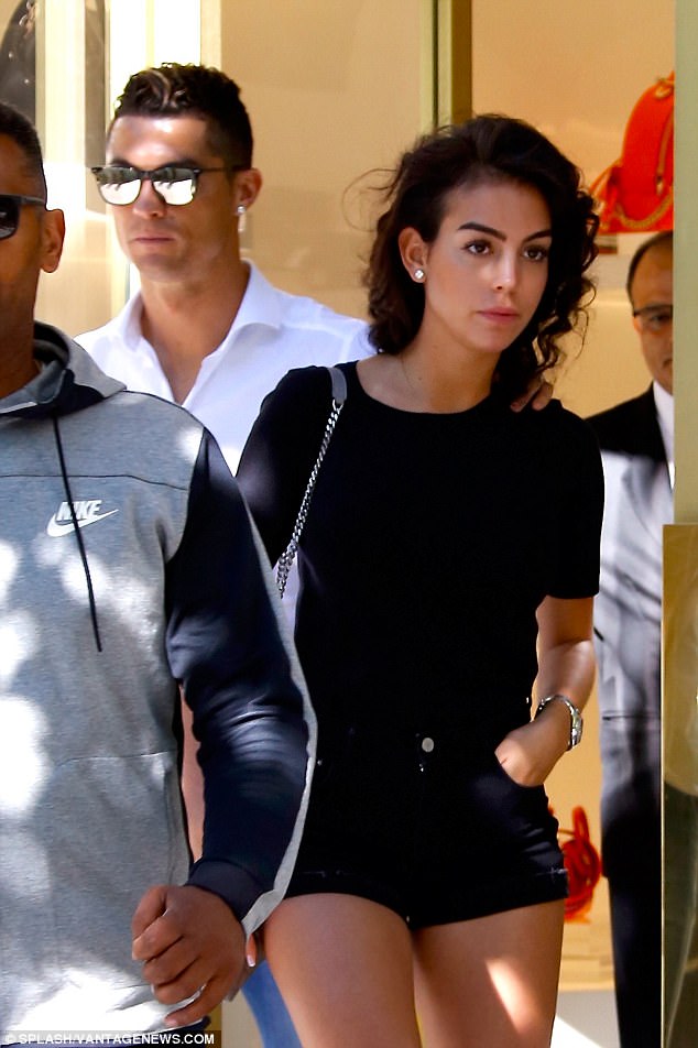 Georgina Rodriguez and Christian Ronaldo holding hands in ...